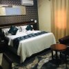 Отель Lion Luxury Suites, фото 4