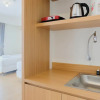 Отель Twin Bed Studio Room at Annora Living Apartment, фото 8