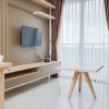 Отель Nice And Restful 2Br At Sky House Bsd Apartment, фото 1