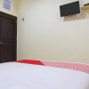 Отель OYO 1681 The Kost Tdm 2, фото 7