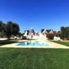 Отель Antico trullo ristrutturato con piscina e giardino, фото 8