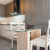 Отель Good And Homey 2Br At Nifarro Park Apartment, фото 4