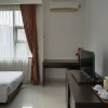 Отель Twin Guest House Grand Wisata, фото 12