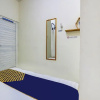 Отель SPOT ON 90780 Gang Tengah Homestay Syariah, фото 4