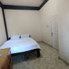 Отель OYO 93207 Merah House, фото 8