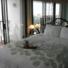 Отель By The Sea Gulf View Deluxe Condo, фото 37