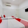 Отель OYO 93011 Hotel Griya Lestari Pati 2, фото 12