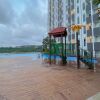 Отель Comfortable 1Br Without Living Room At Amartha View Apartment, фото 10