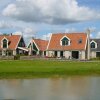 Отель Carefully Furnished Chalet With Microwave, at the Wadden Sea, фото 15