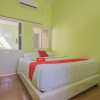 Отель Wisma Syariah Melon Paska by RedDoorz, фото 3