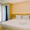 Отель Good Deal And Comfy 2Br Apartment At M-Town Residence в Куруге