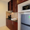 Отель Exclusive and Cozy 2BR Apartment at The Empyreal Epicentrum, фото 20