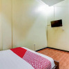 Отель OYO 91036 Hotel Simpang Lima Gkpri, фото 2