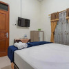 Отель The Lima Guest House Syariah By RedDoorz, фото 6