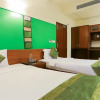 Отель Treebo Trip Cynosure Suites, фото 17