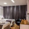 Отель Vogue Hotel в Сан-Жуан-ди-Мерити