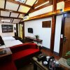 Отель Lijiang Yiran Ethnic custom Viewing Inn, фото 26