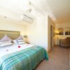 Отель Cape Point Beachfront Suites And Penthouses в Бейн-Бофе