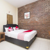 Отель OYO 952 Annisa Syariah Guest House, фото 7