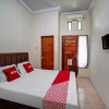 Отель OYO 90751 Graha Sei Batugingging, фото 6