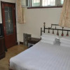 Отель Pingyao Jiuhe Guesthouse, фото 6