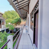 Отель OYO Life 92901 Kost Bu Nur, фото 14