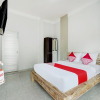 Отель OYO Flagship 90756 Melasti Hills Room & Cafe, фото 5