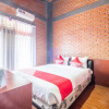 Отель OYO 900 Villa Buleud, фото 9