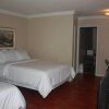 Отель Guest Inn & Suites, фото 9