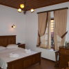 Отель Heliodora Deluxe Triple Room 6, фото 4