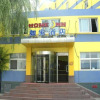 Отель Home Inn (Jinbei Nanyuan Street Red Star Macalline Branch), фото 1
