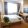 Отель GreenTree Inn Shandong Heze Caoxian Zhuangzhai Town Oriental Times City Business Hotel, фото 4