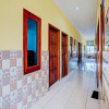 Отель OYO 90234 Dhoho Family Guest House, фото 6