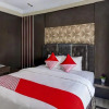 Отель OYO 90564 Hotel Merangin Syariah, фото 11