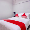 Отель OYO 1805 Fatmawati Mansion Syariah, фото 2