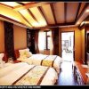 Отель Courier Inn Lijiang, фото 4