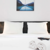 Отель Homey And Simply Studio Room At Enviro Apartment, фото 4