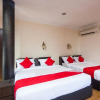 Отель T P Hotel by OYO Rooms, фото 7