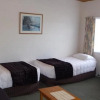 Отель Coachmans Lodge Motel, фото 2