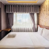 Отель Cozy 2Br At Royal Makassar Apartment, фото 16