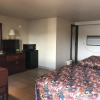 Отель Hwy Express Inn & Suites, фото 4