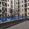 Отель Comfy & Pleasant 2BR at Sudirman Suites Apartment в Бандунге