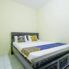 Отель OYO Life 91606 Nadin Guest House Syariah, фото 3