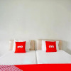 Отель OYO 91244 Hotel Lembah Nyiur, фото 4