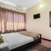 Отель Oyo 388 Teekas Holiday Inn, фото 7
