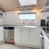 Отель 10 Person Holiday Home in Lokken, фото 9