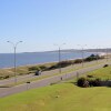 Отель Ocean Front Deluxe Apartment, фото 21