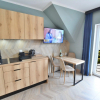 Отель Comfortable apartment for 3 persons right by the sea, Ustronie Morskie, фото 3