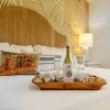 Отель Sailfish Gulf Suites #1, Beachfront, Steps to the Sand cottage в Холмс-Биче