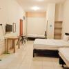 Отель OYO 936 Tremigo Guest House Syariah, фото 9